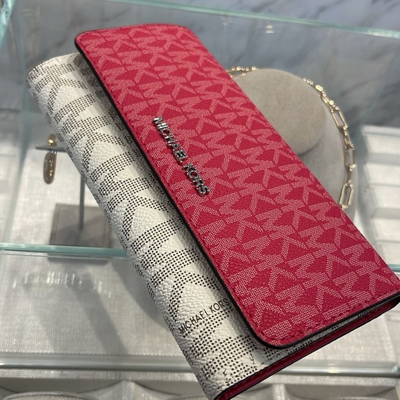 Michael Kors Handbags - MICHAEL KORS Jet Set Travel Signature Logo Tri-Fold Wallet
DARK RASPBERRY MULTI